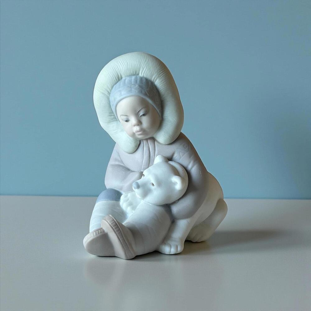 Lladro Eskimo Boy with Polar Bear Cub Figurine • Matte Finish Porcelain